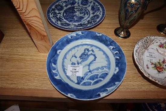 An 18th century Kangxi Chinese blue and white dragon plate and one other. largest diameter 22.5cm